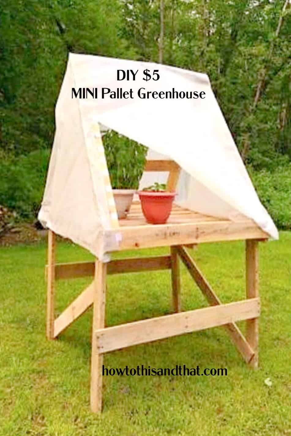 pallets used to make a small greenhouse.