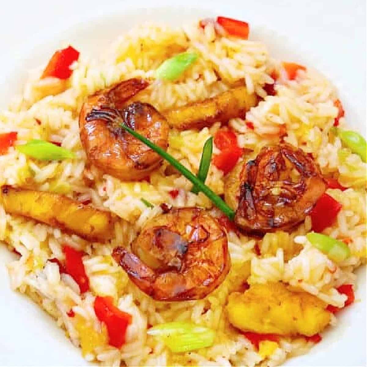 pineapple rice with shrimp in a bowl.