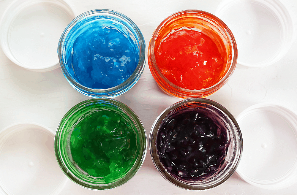colorful jars of DIY fingerpaint.
