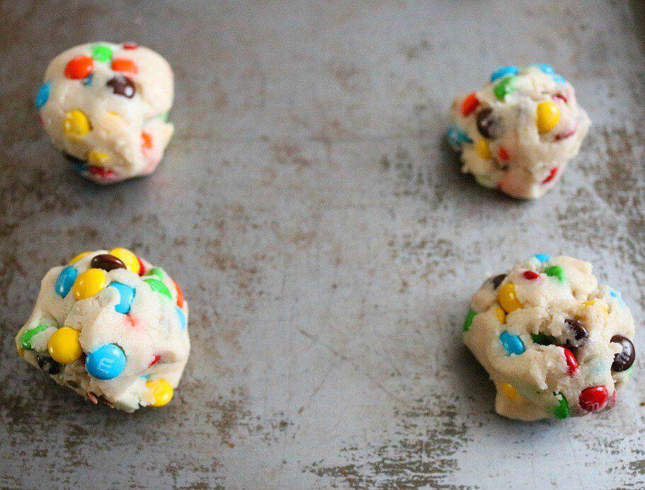 cookie dough balls on sheet pan.