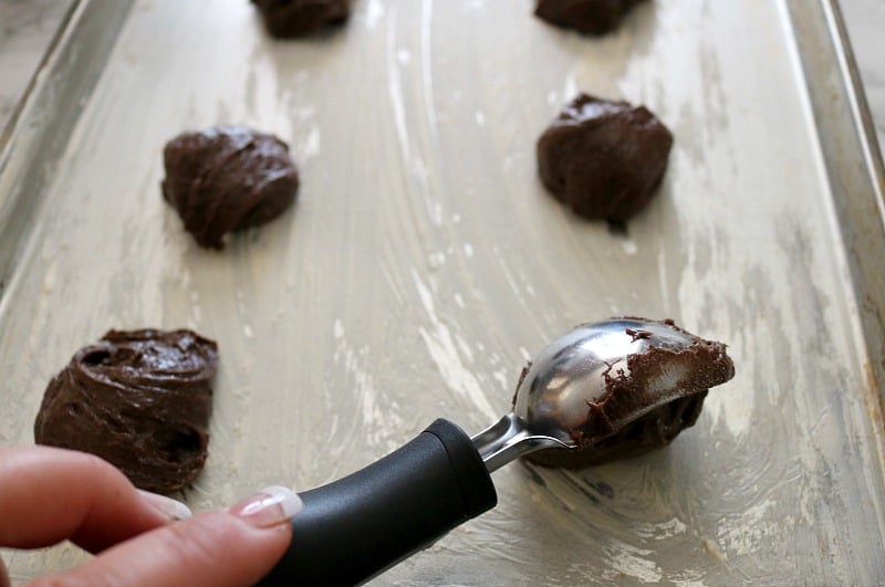 whoopie pie batter scooped on sheet pan. 