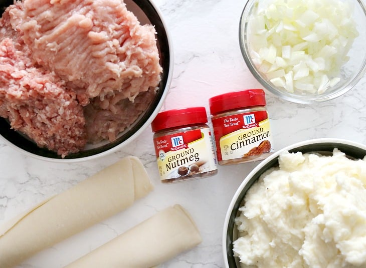 Ingredients for Pork Pie Recipe on white marble surface