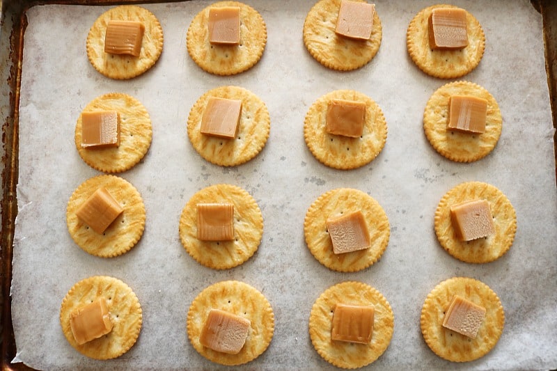 ritz crackers with caramel on sheet pan for ritz sandwich crackers. 