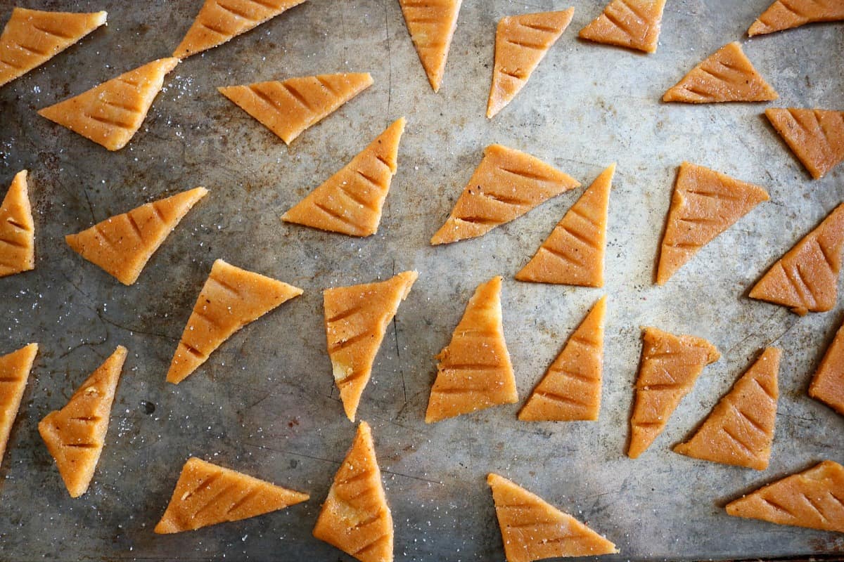 triangles of dough cut on pan.