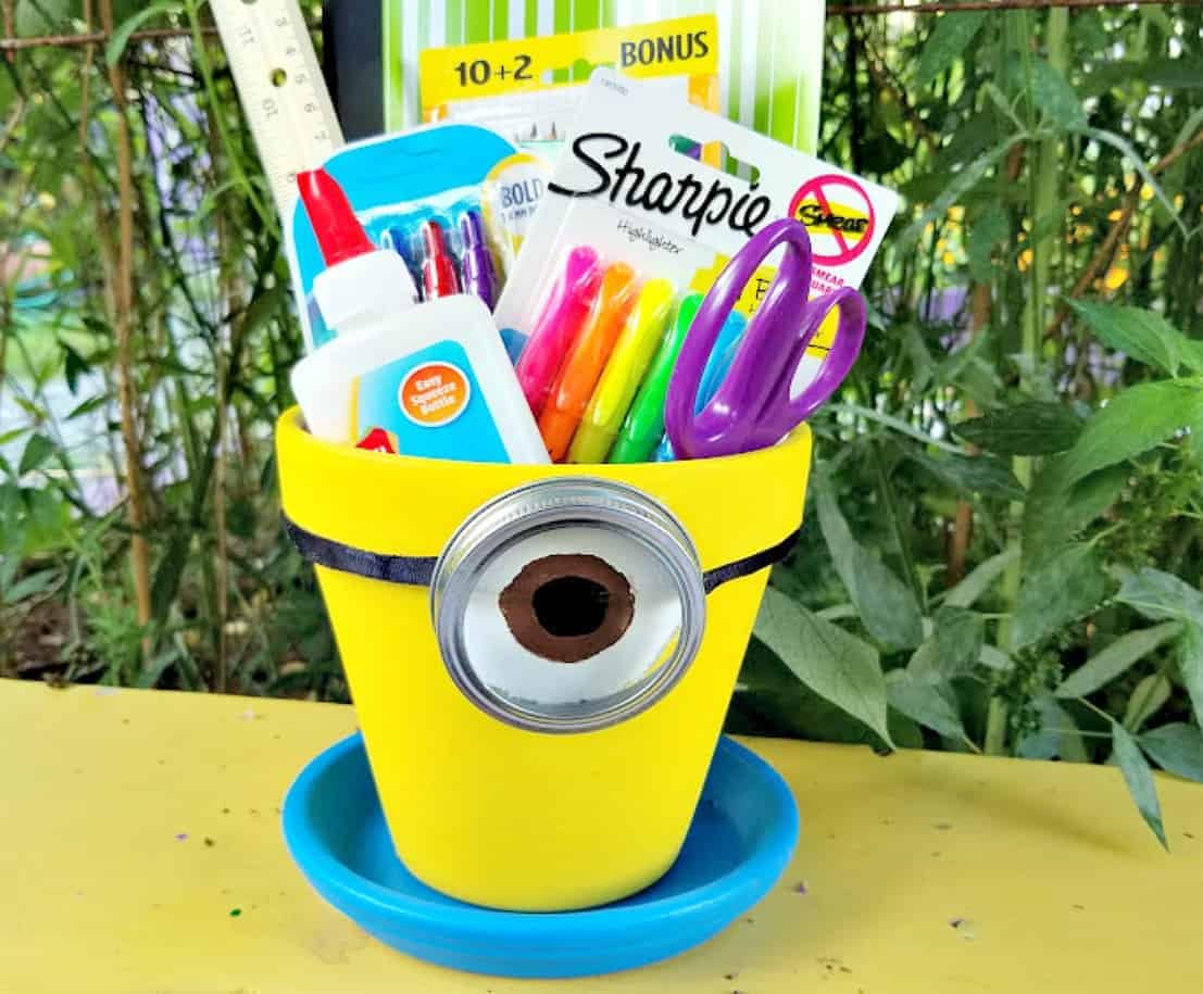 school supplies in a dollar store terracotta pot. 