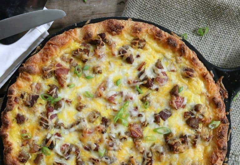 meat lover's keto fathead pizza in skillet.