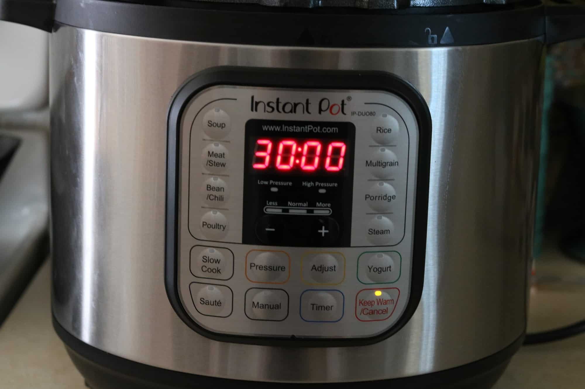 instant pot on a counter set to 30 minutes. 