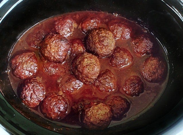 meatballs in sauce in the crock pot. 