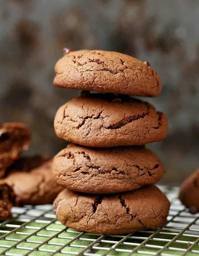  hot cocoa cookies stacked up on baking sheet