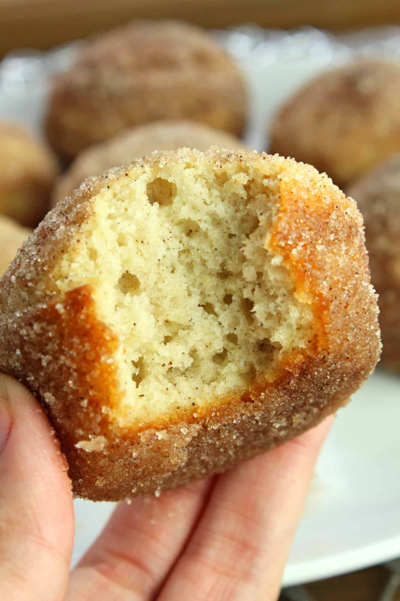 keto donut muffin with a bite taken out of it. 