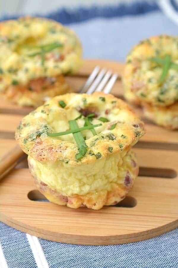 egg and cheese bite on cutting board.