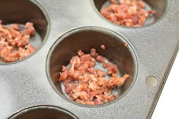 bacon crumbles in muffin tin.