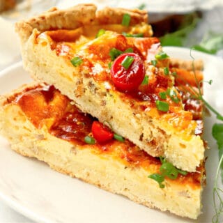 slices of easy bacon quiche on plate.
