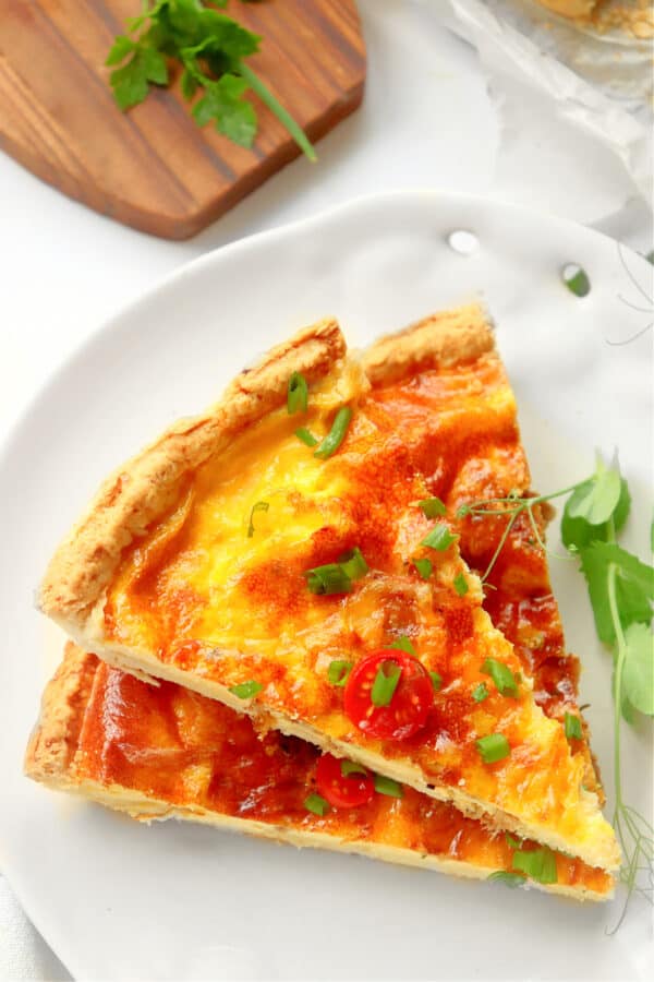easy basic quiche slices on plate. 