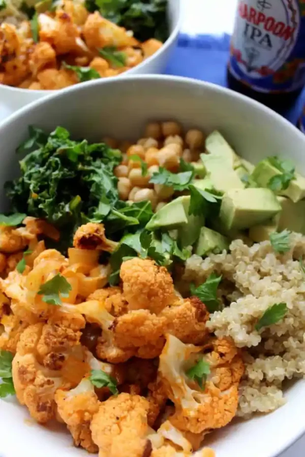 spicy cauliflower and greens in salad bowl. 