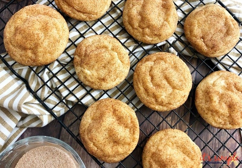 keto snickerdoodle cookies on a cooling rack. 