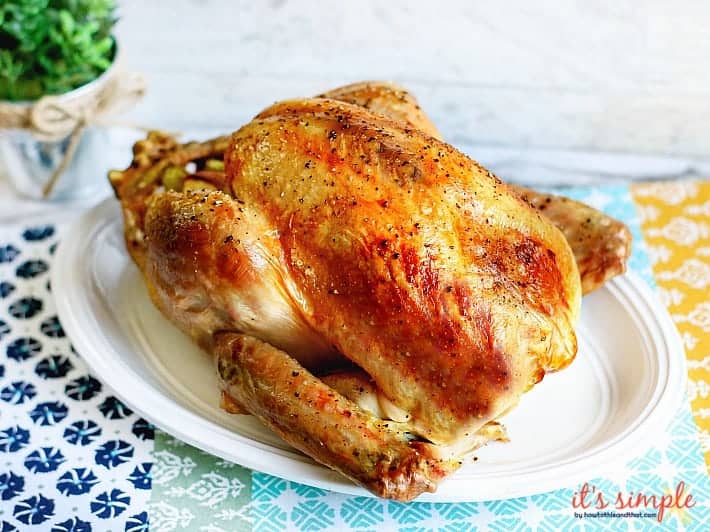 whole thanksgiving turkey displayed on a plate. 