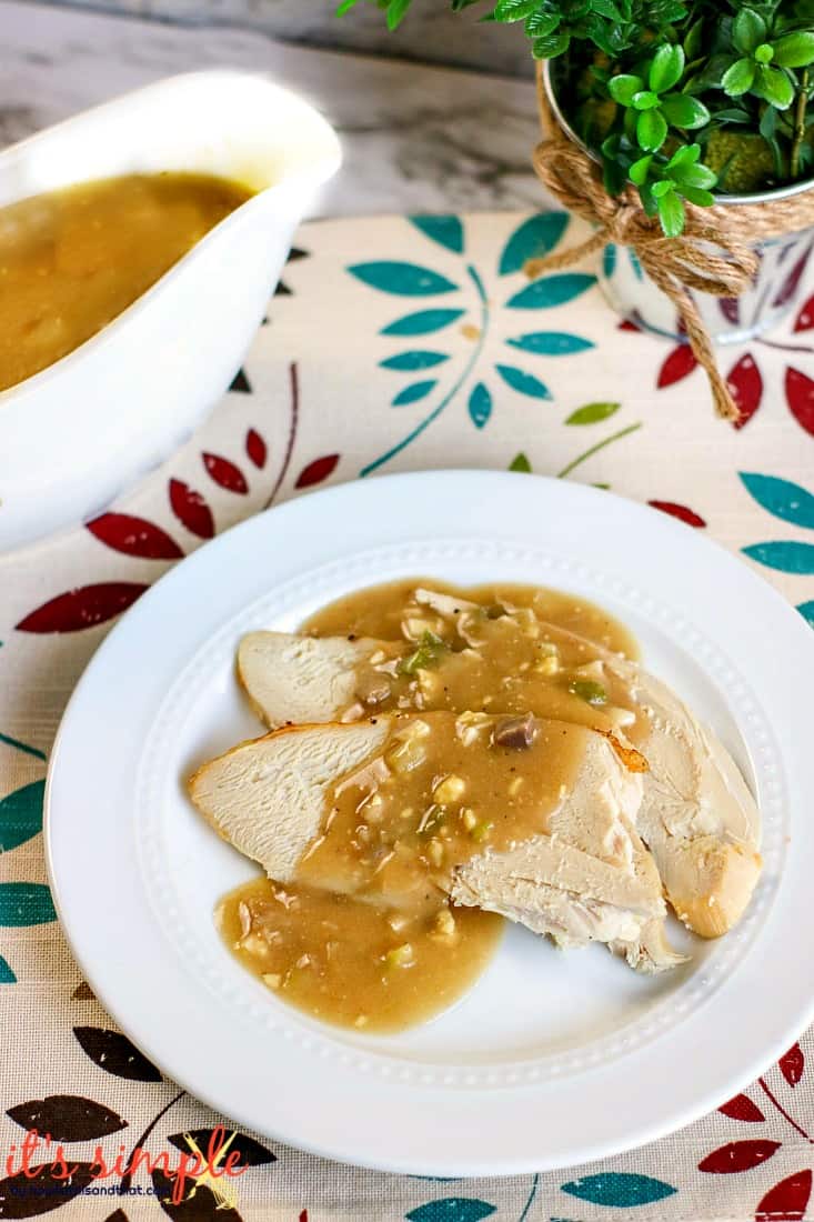 slices of turkey on white plate. 