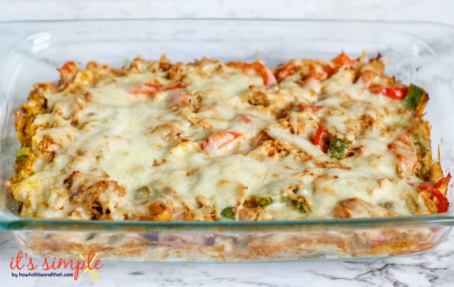 a rectangle casserole dish full of baked chicken, cheese and peppers for a low carb dinner.