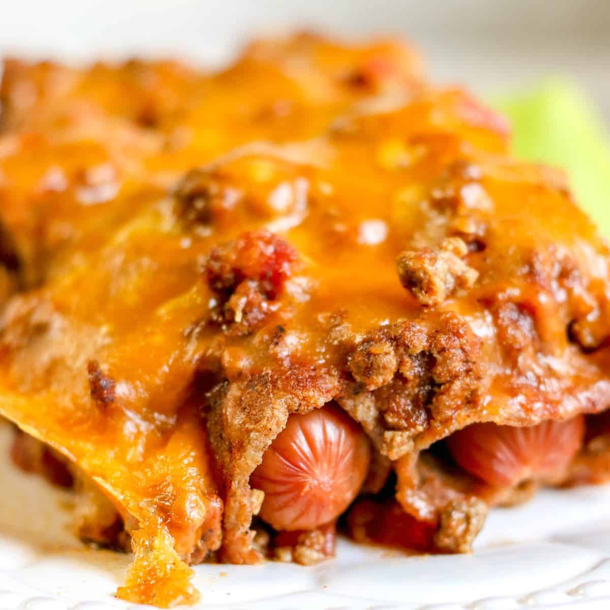 a serving of keto chili dog casserole on a plate.
