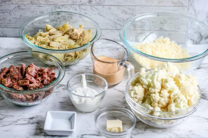 ingredients needed for reuben casserole on the counter all laid out. 