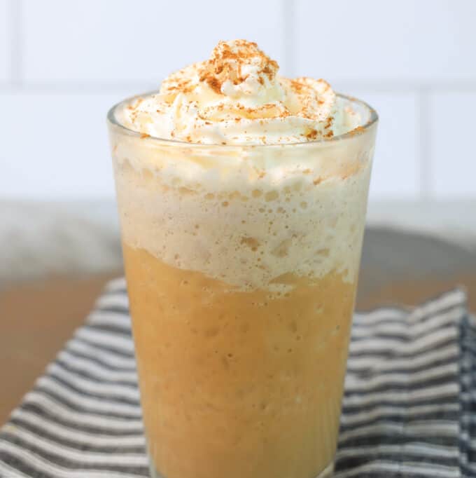 homade keto cinnamon dolce frappuccino in a glass with frothy top.