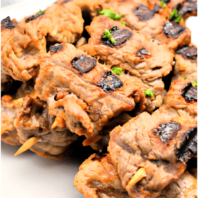 keto beef teriyaki skewers on a plate.