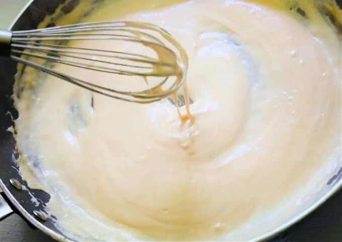 cheese sauce in skillet.