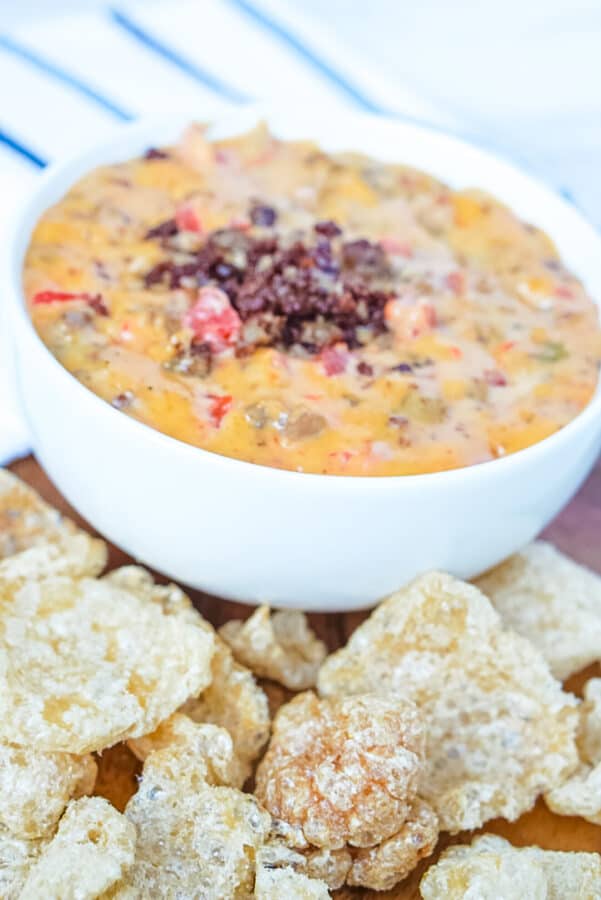cheese dip with sausage and rotel in bowl. 