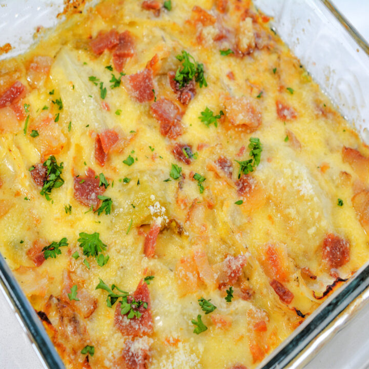baked cabbage au gratin in glass dish.