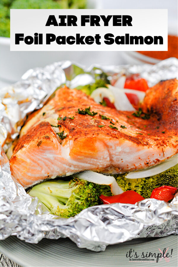 cooked salmon in foil with vegetables. 