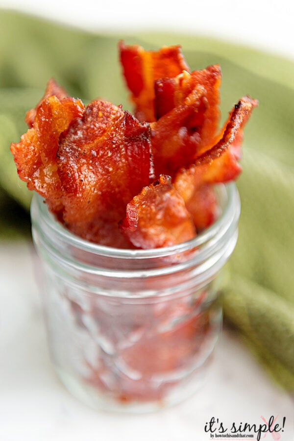 keto candied bacon in a glass jar. 