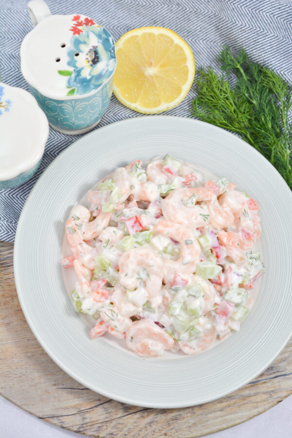 Detailed view of low carb shrimp salad with creamy dressing and crunchy vegetables