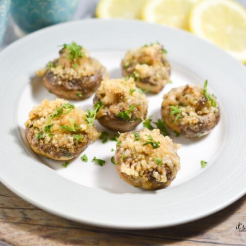 Garlic parmesan mushrooms baked with crispy topping in a dish