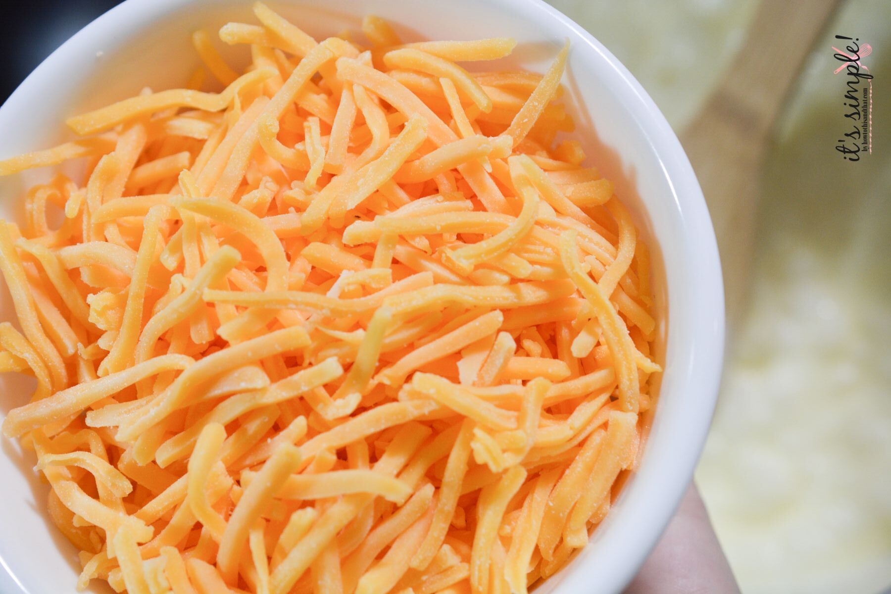 cheese in a small bowl for Keto cheese sauce